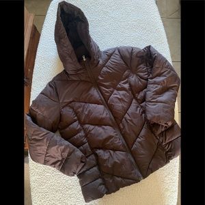 Women’s brown puffer jacket.